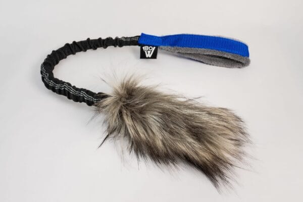 Mordedor de motivacion Risa BOW de pelo sintetico largo azul para perros